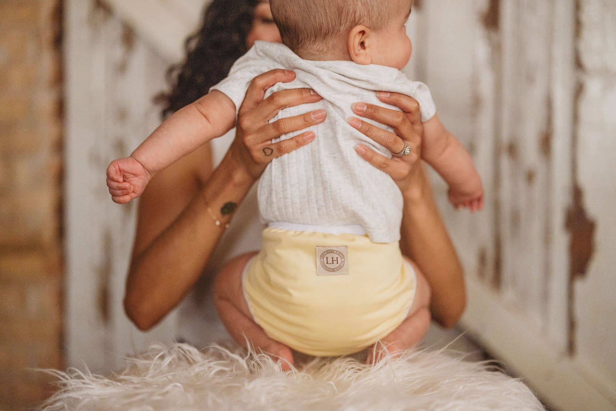 Lighthouse Kids Co. cloth diaper covers have leg gussets to keep messes contained.  Voted best cloth diaper brand for AI2 cover diapers.  Small mom-run business in Iowa City, IA