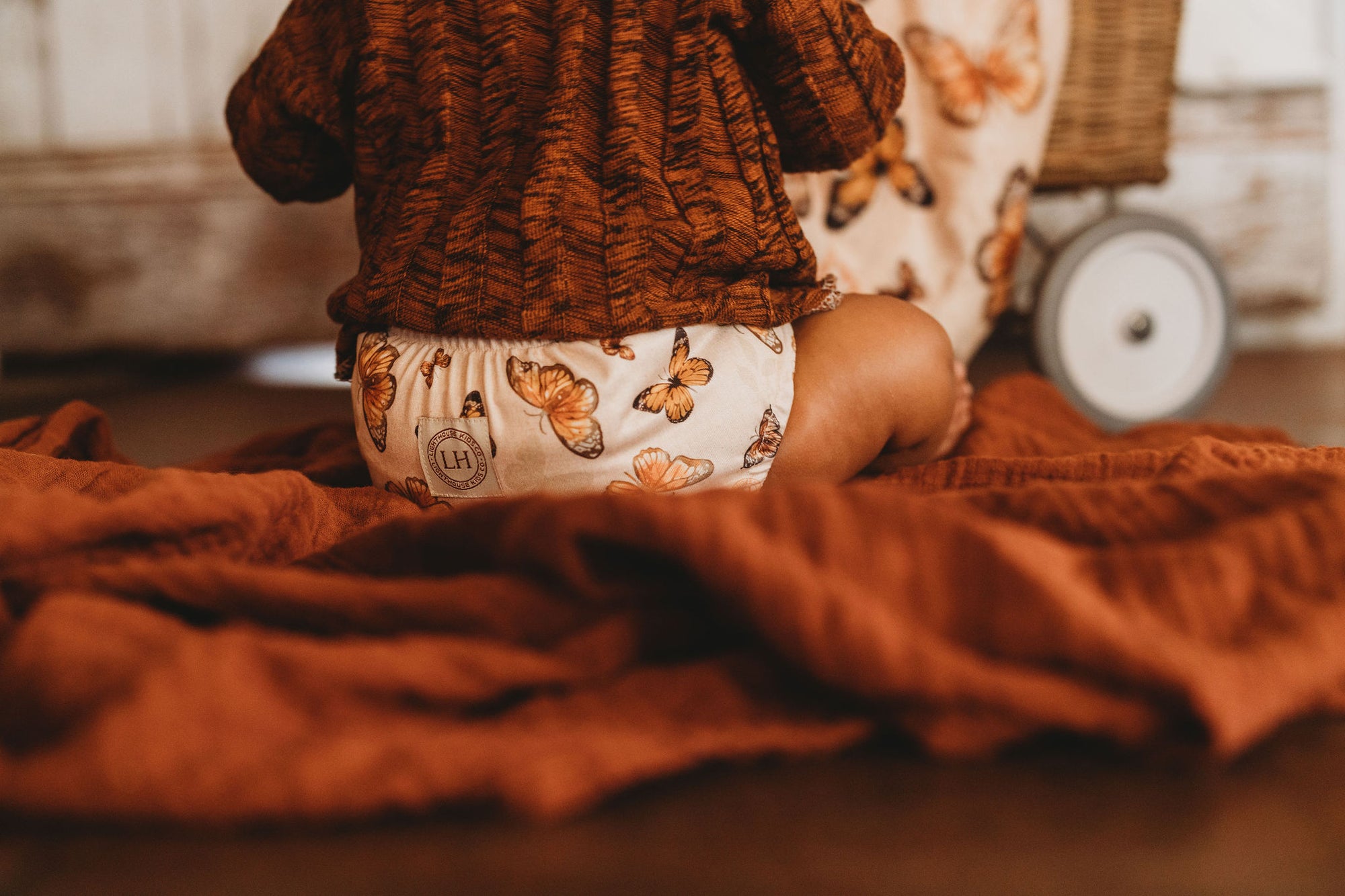 Lighthouse Kids Co. cloth diaper covers have leg gussets to keep messes contained.  Voted best cloth diaper brand for AI2 cover diapers.  Small mom-run business in Iowa City, IA