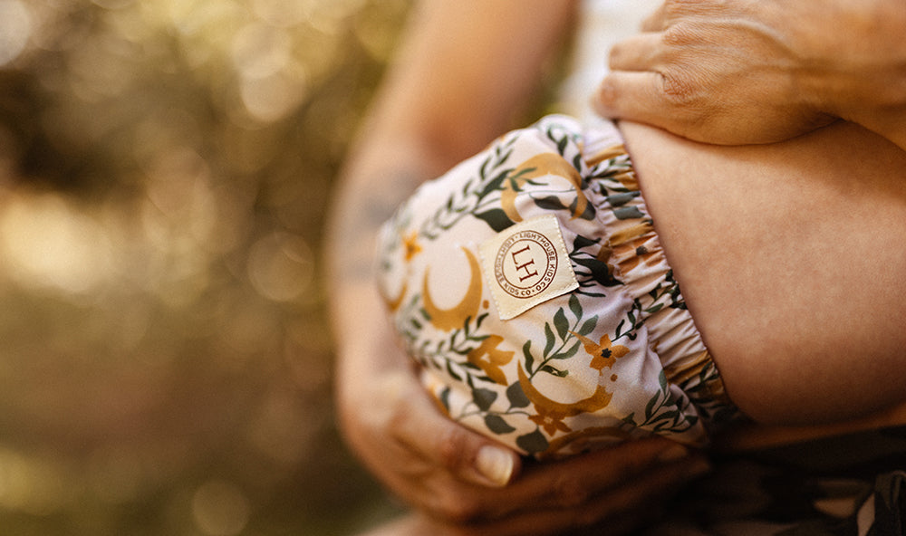 cloth diaper aio all in one with flowers for baby girls. Best Cloth diaper brand Lighthouse Kids Company