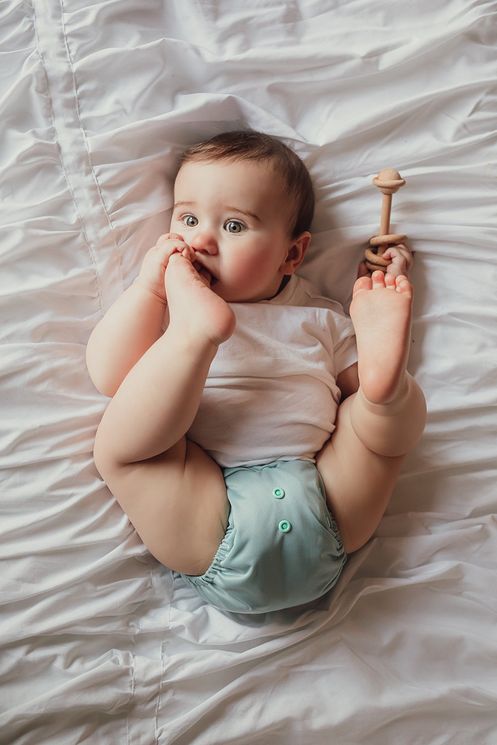 How To Prevent Cloth Diaper Leaks at Night with smart fit and absorbency tips using Lighthouse Kids Company cloth diapers for dry nights