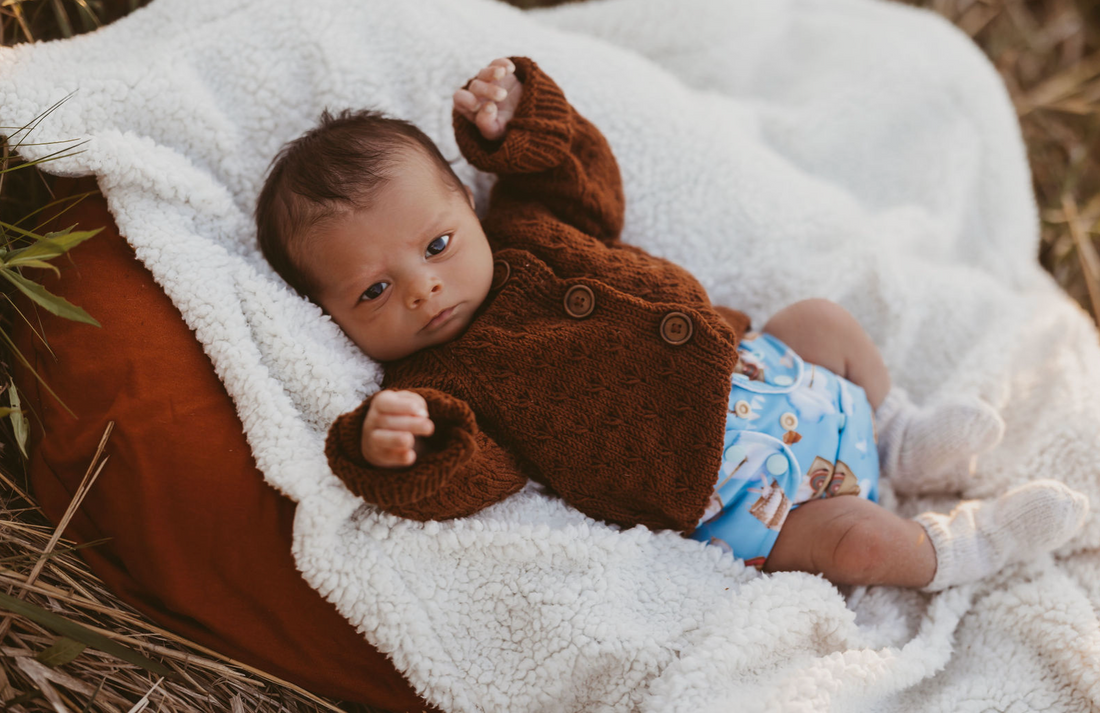 Why do my cloth diapers still smell like pee after washing?