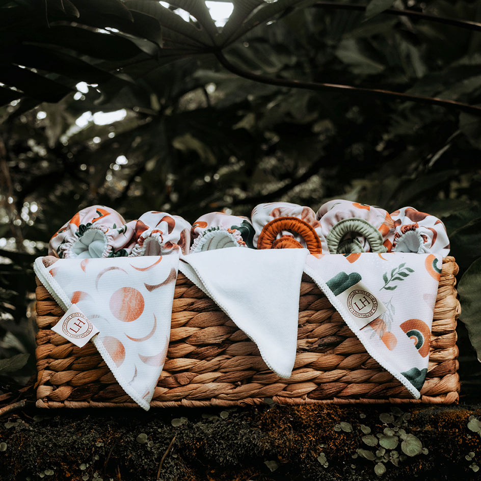 Lighthouse Kids Co. recycled pocket cloth diaper with Athletic Wicking Jersey and Tummy Panel.  Small WAHM business in Iowa City, IA.