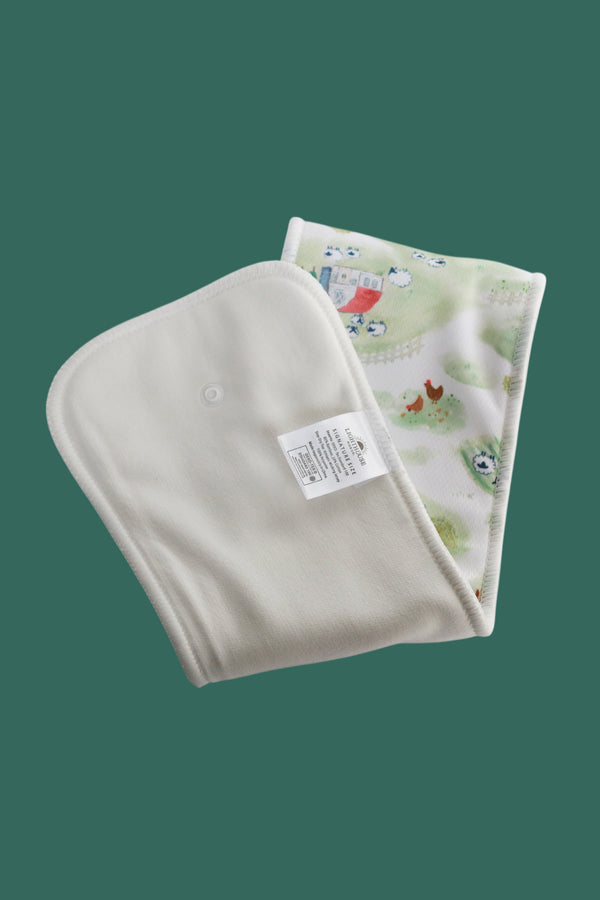 Snap-in cloth diaper insert with breathable AWJ stay-dry layer in Farm print