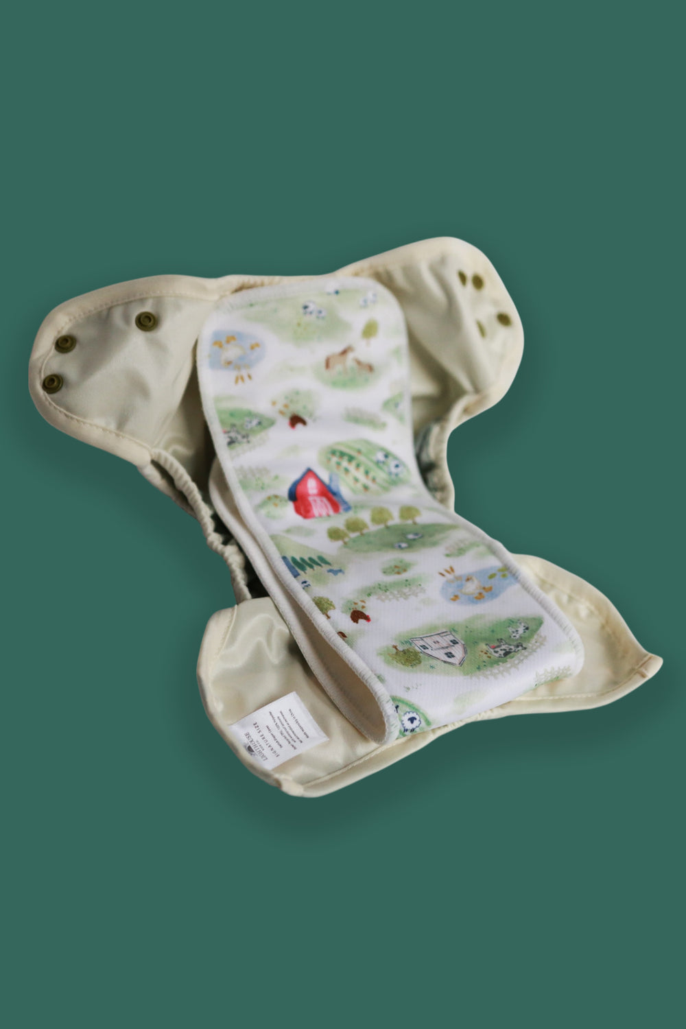 Absorbent snap-in cloth diaper insert with AWJ stay-dry top