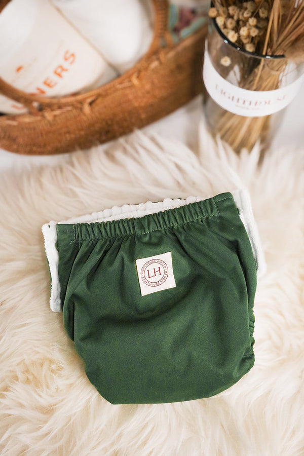 Reusable Potty Training Pants for toddlers pants by Lighthouse Kids Company with soft trim design flat lay