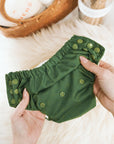 Lighthouse Kids Co. cloth diaper reusable potty training pants keep messes contained.  Voted best cloth diaper brand for reusable pull-ups.  Small mom-run business in Iowa City, IA